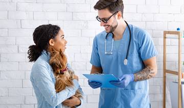 Doctor holding a pet